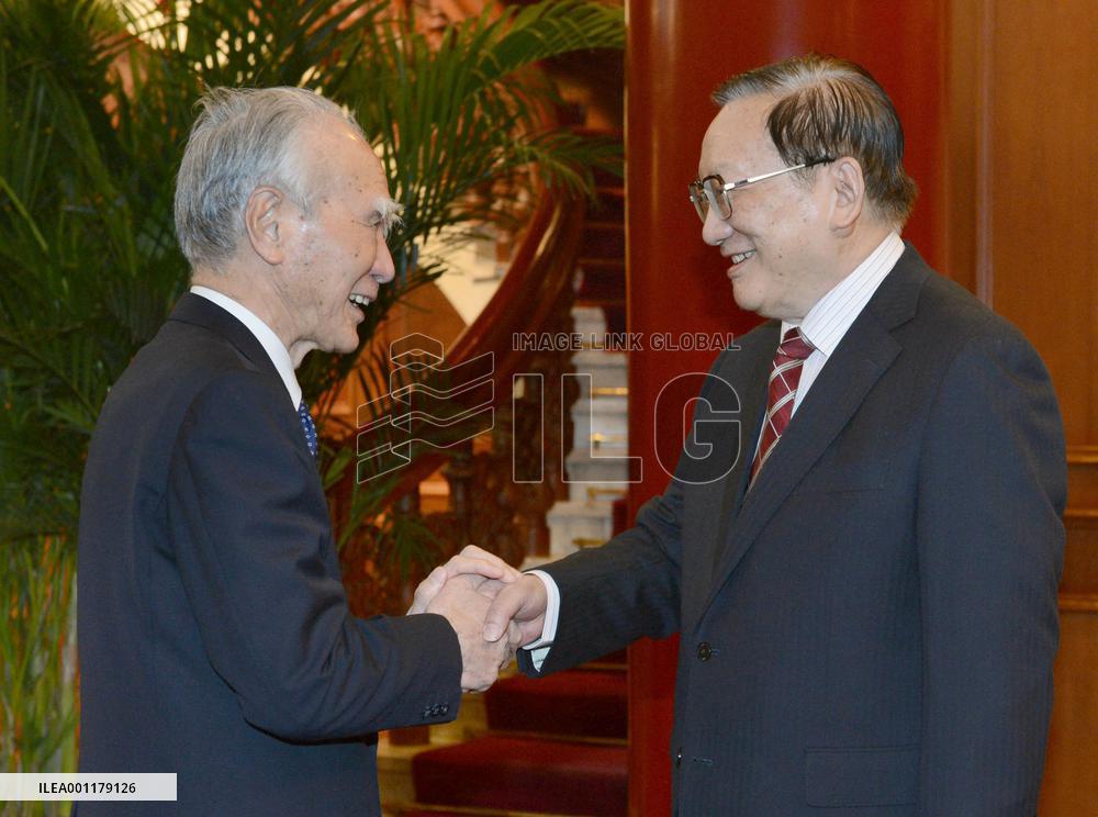 Ex-Japan premier in China