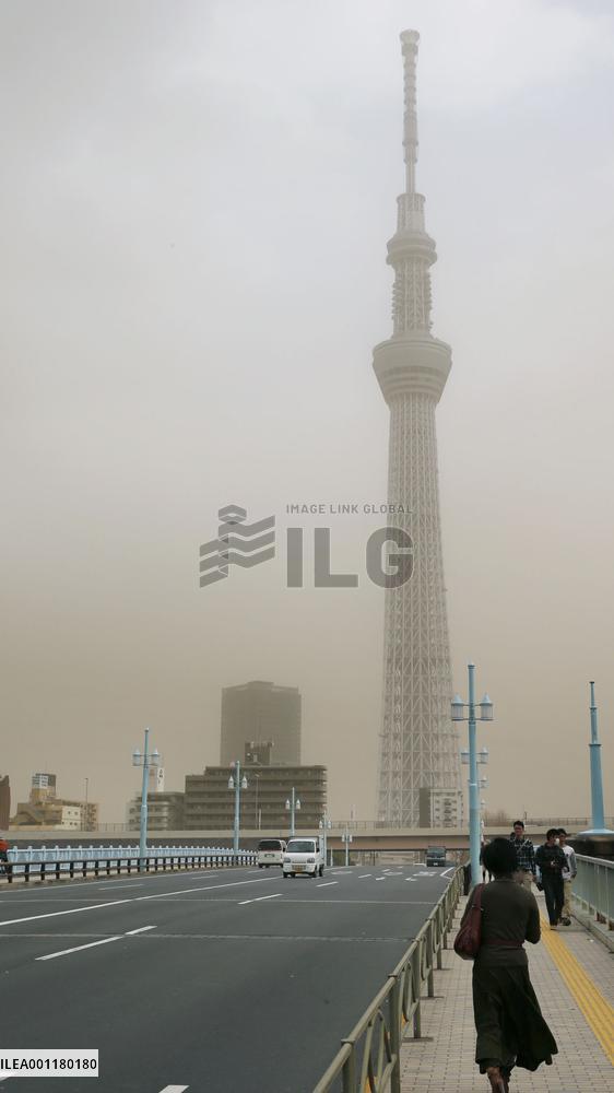 Dusty haze covers Tokyo