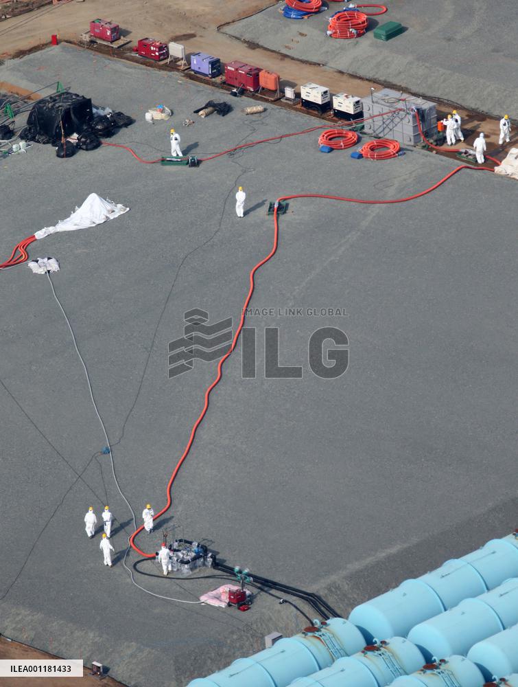 TEPCO transfers radioactive water to reliable container