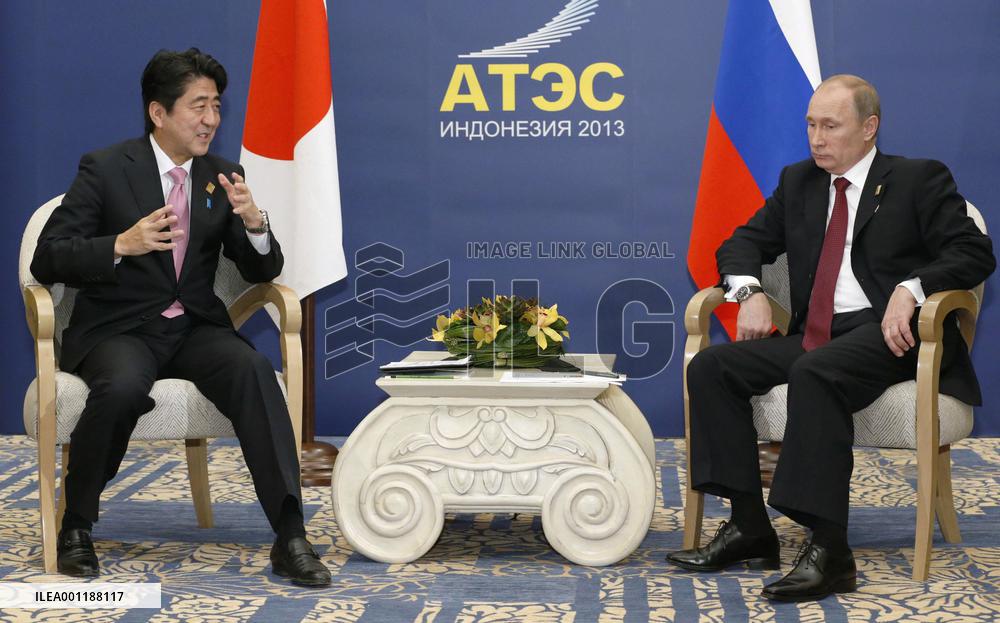 Abe, Putin