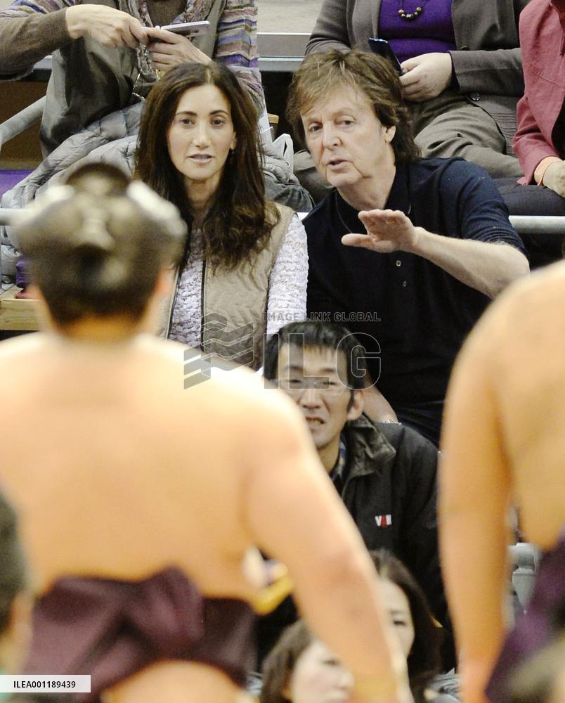 Paul McCartney watches sumo