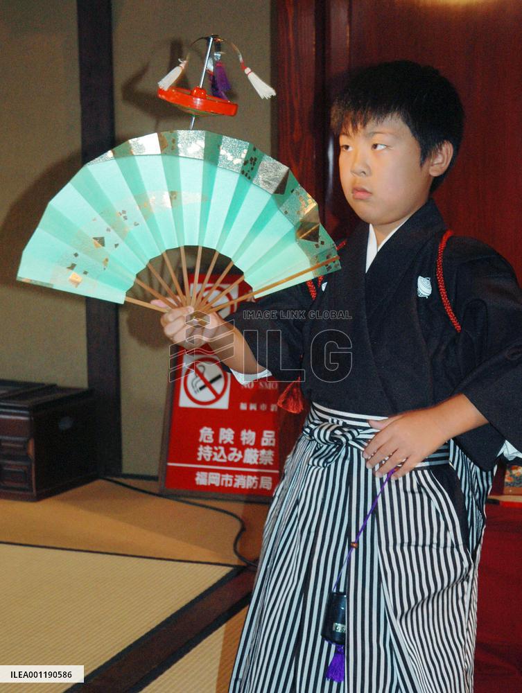 10-yr-old succeeds spinning top performing arts