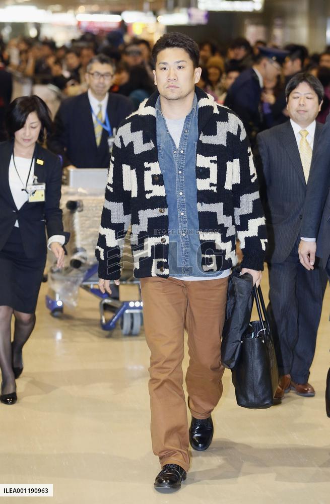 Tanaka back in Japan