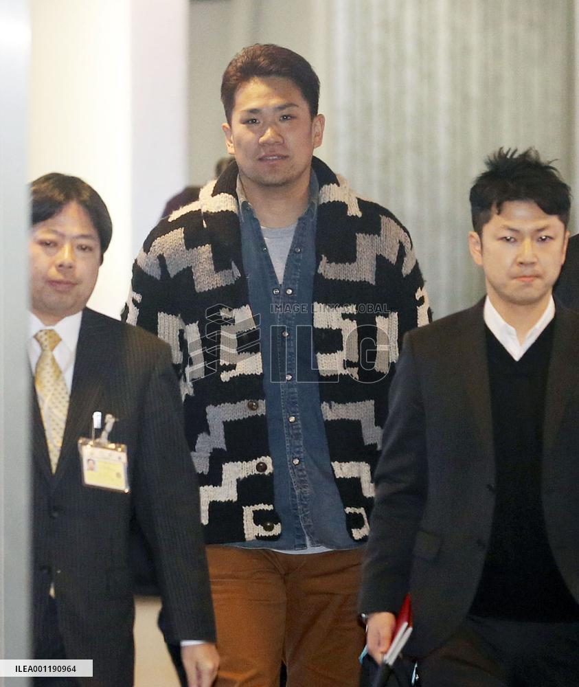Tanaka back in Japan