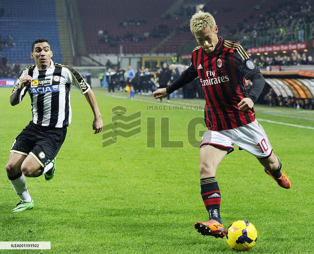 Japanese player Honda in action in Italian Cup game