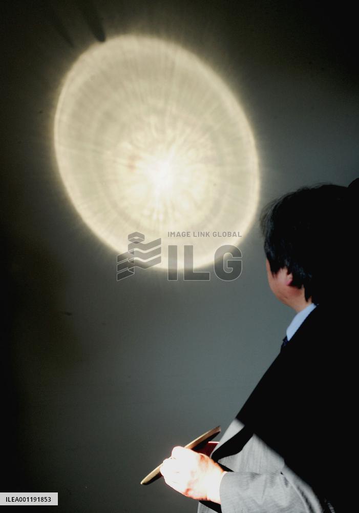 Ancient mirror projects mysterious image