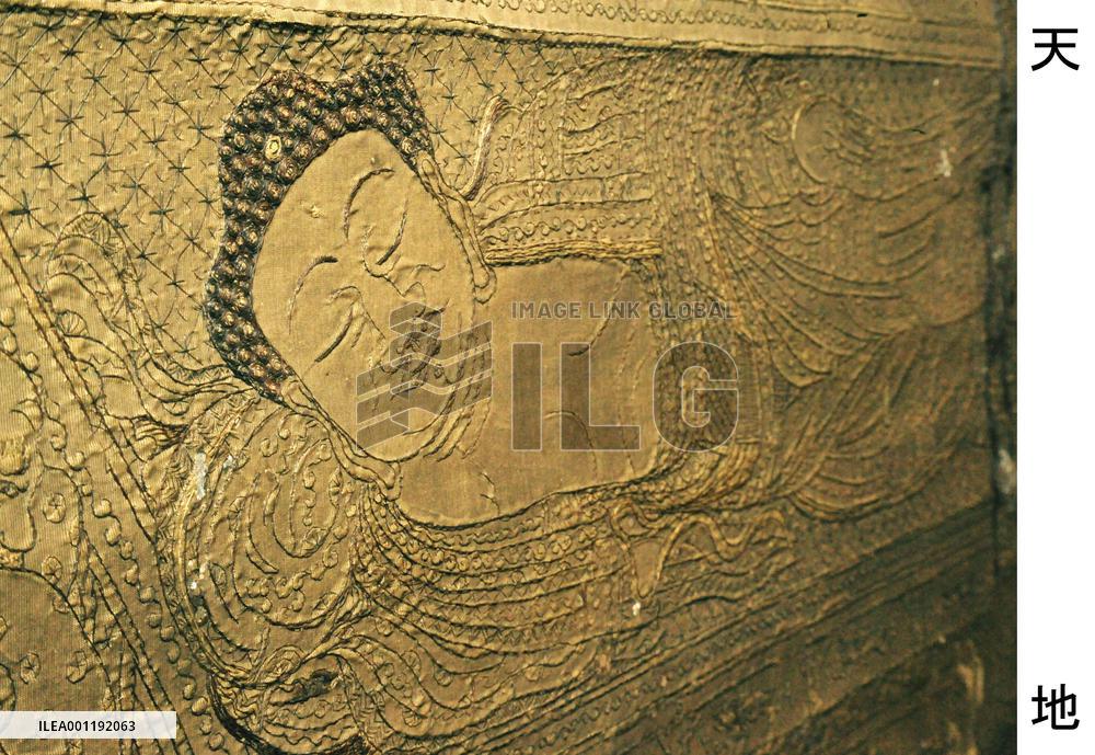 Buddha in nirvana depicted in hair embroidery