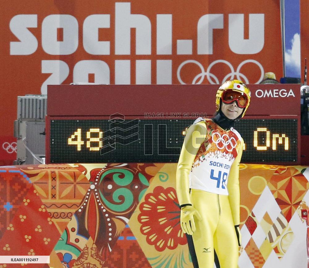 Japanese ski jumper Kasai looks at scoreboard in Sochi