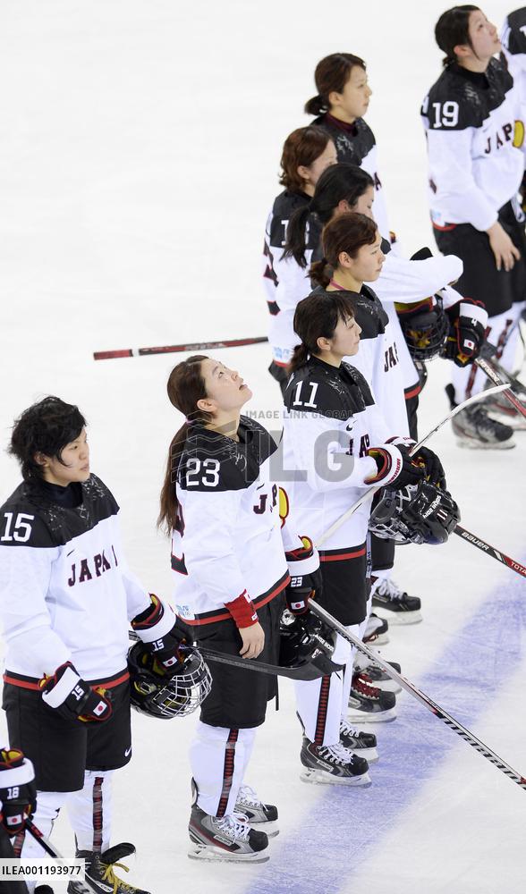 Japan players line up after loss to Germany in women's ice hockey
