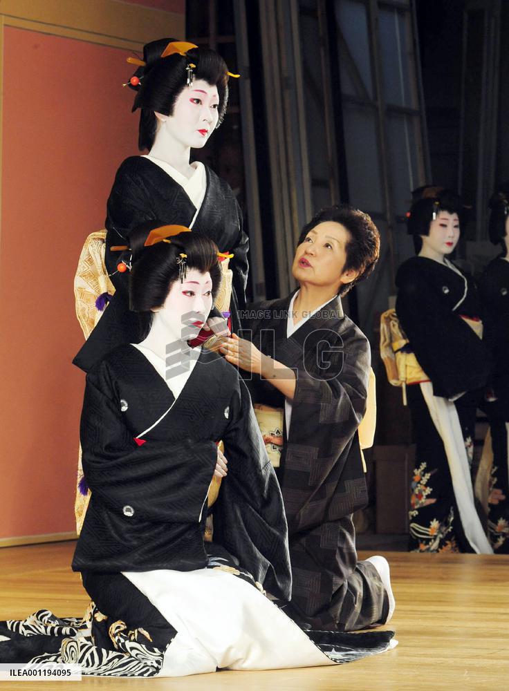 Kimono fitting session for spring dance performance in Kyoto