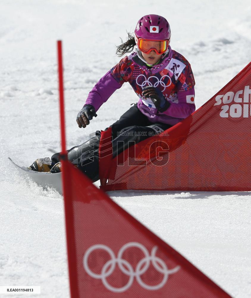 Japan's Takeuchi races in women's snowboard parallel slalom