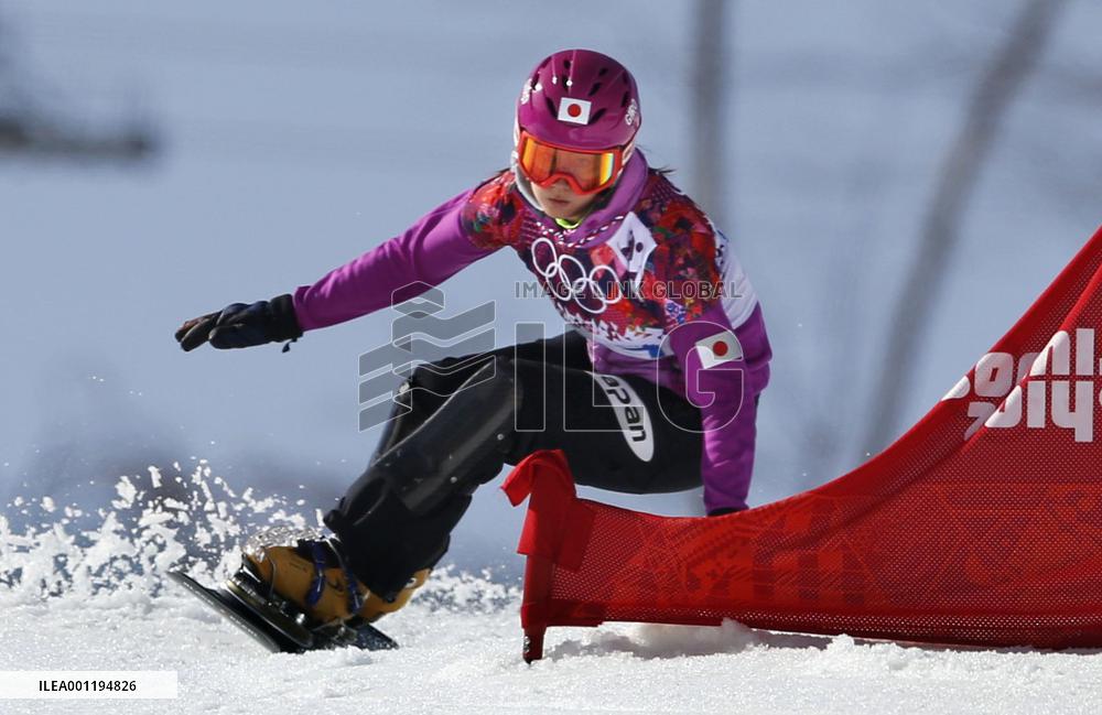 Japan's Takeuchi races in women's snowboard parallel slalom