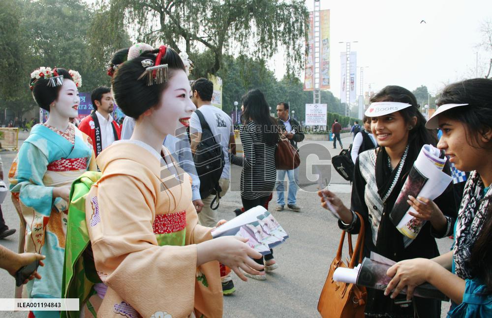 Japanese 'maiko' dancers walk at book fair in India