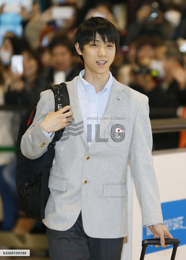 Japanese skaters return from Sochi