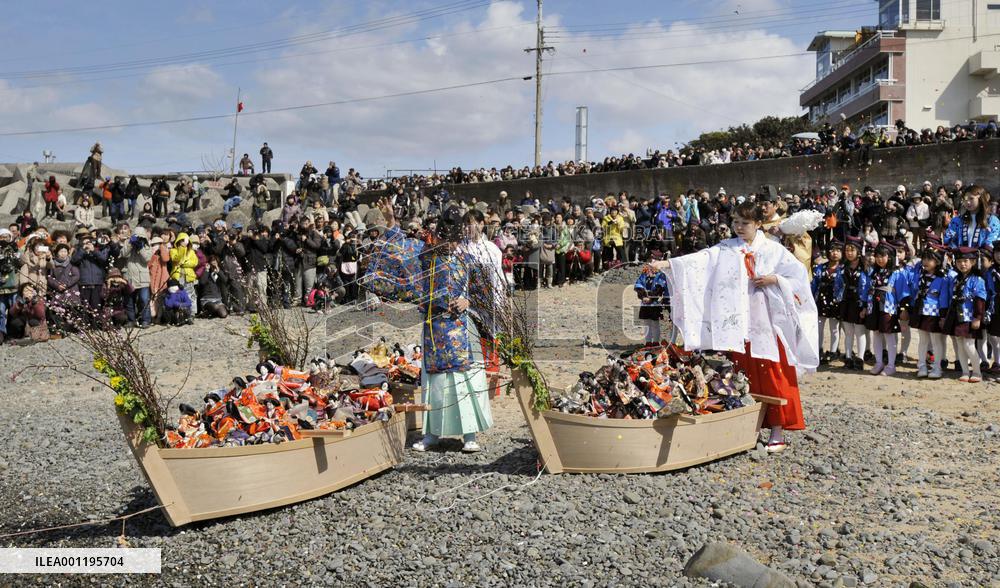 Dolls on tiny boats for seaborne journey in Girls' Day event