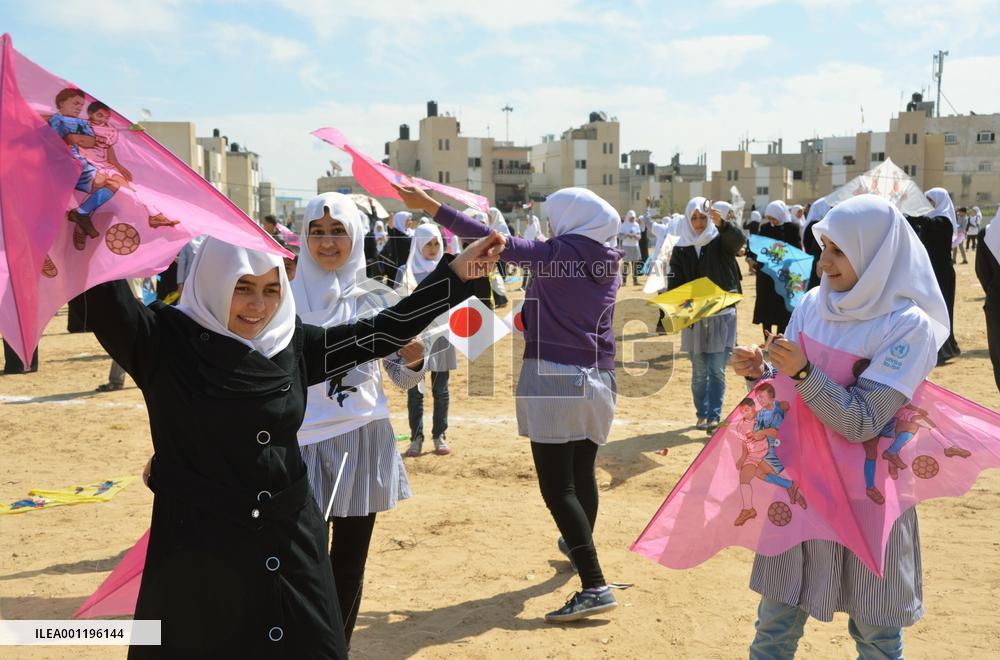 Children fly kites in Gaza for 2011 disaster victims