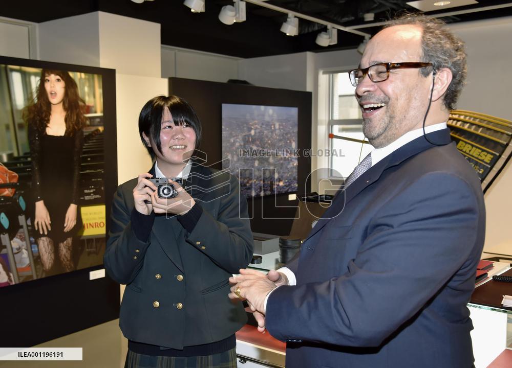 Leica gives girl of quake-hit area camera