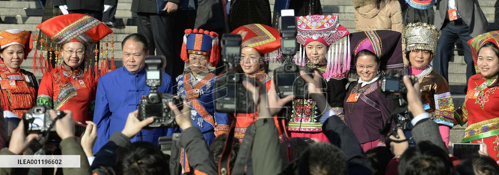 Chinese minority reps pose for photos in Beijing