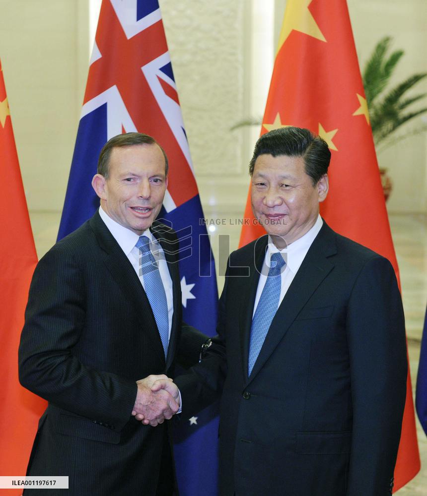China's Xi, Australia's Abbott meet in Beijing