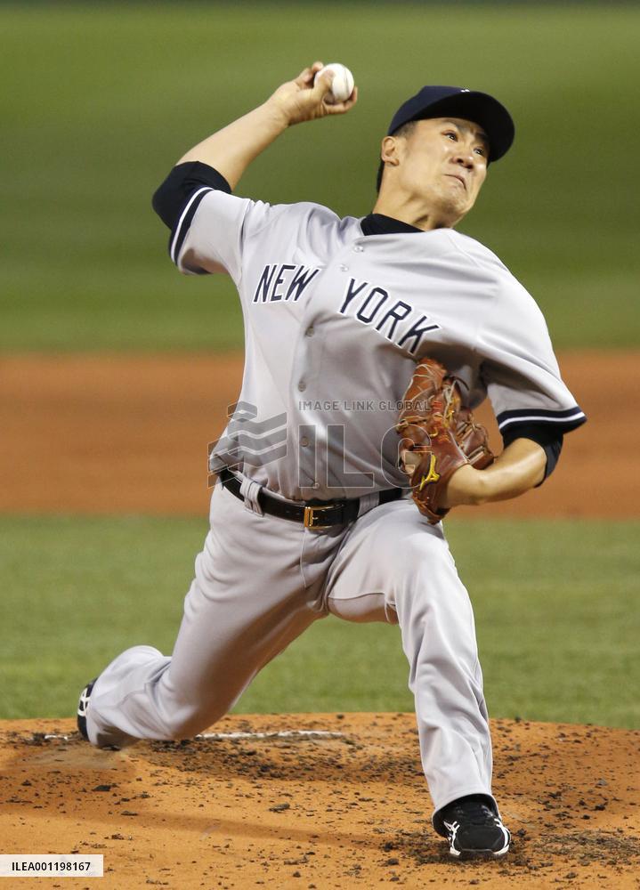 Tanaka earns 3rd win