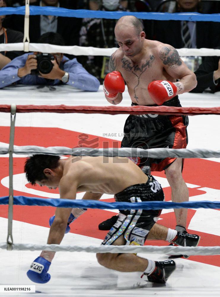 Spain's Martinez beats Japan's Hasegawa by TKO