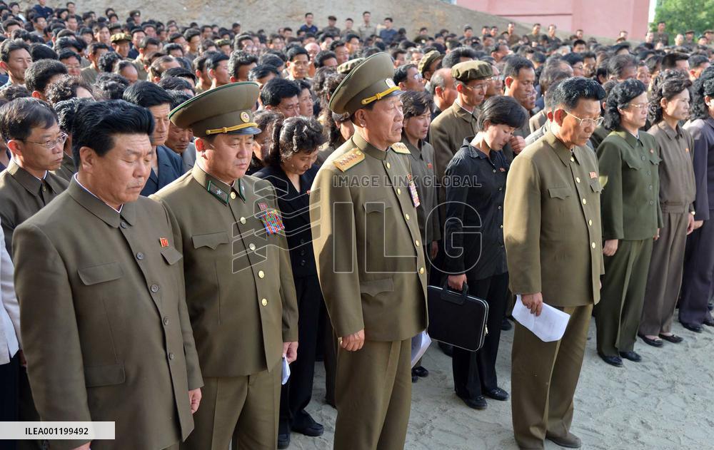N. Korean officers grim at building site after reported mishap