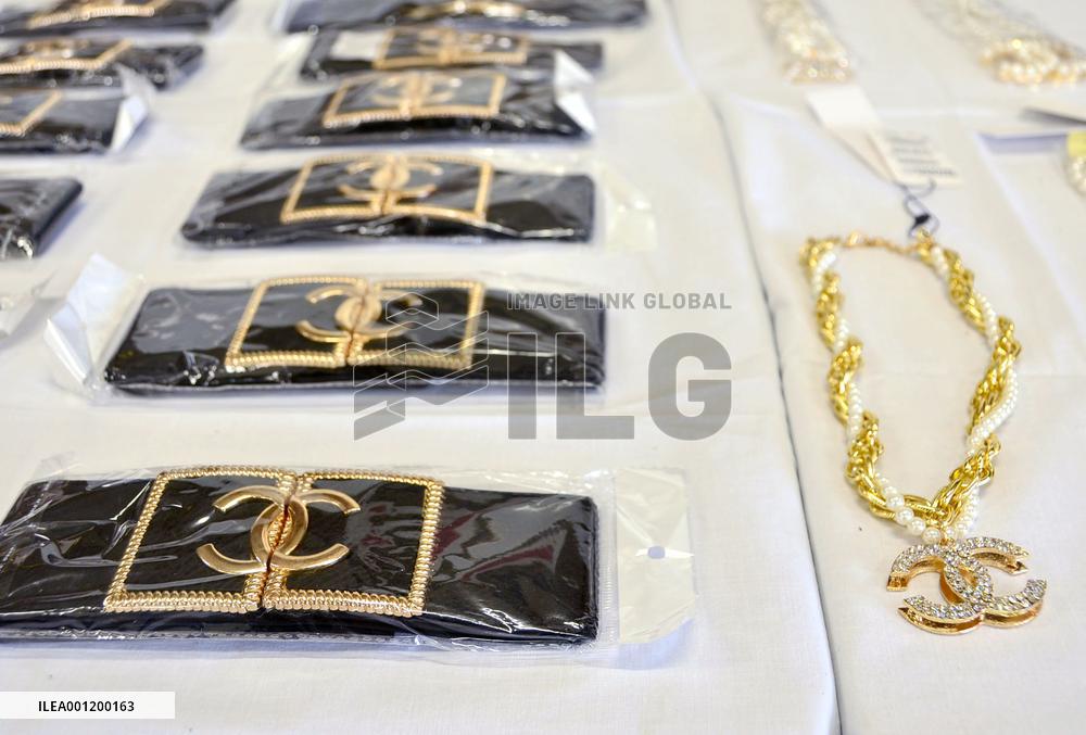 Police confiscate fake Chanel belts, necklaces