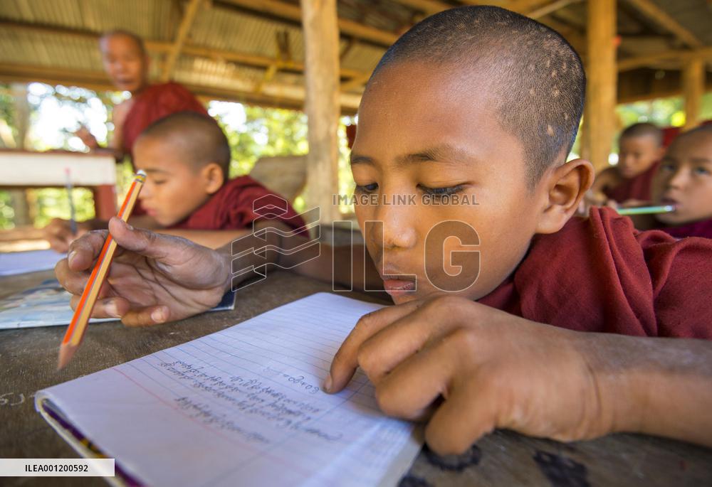 Boy monks study at temple in Myanmar