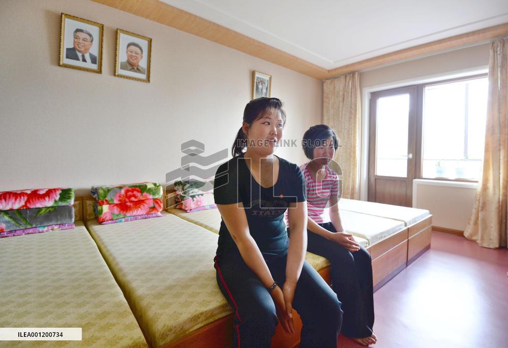 N. Korean female workers relax in new dormitory room