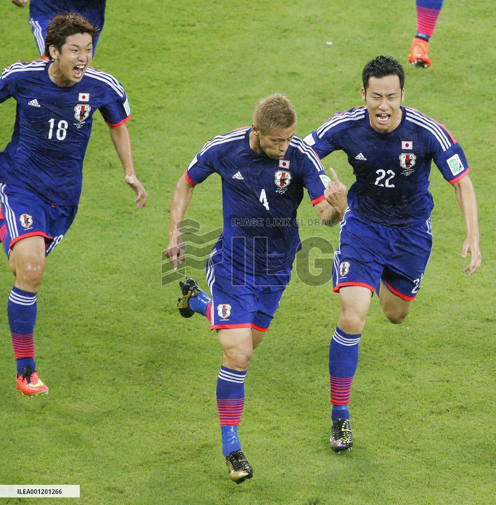 Japan's Honda celebrates goal vs Ivory Coast
