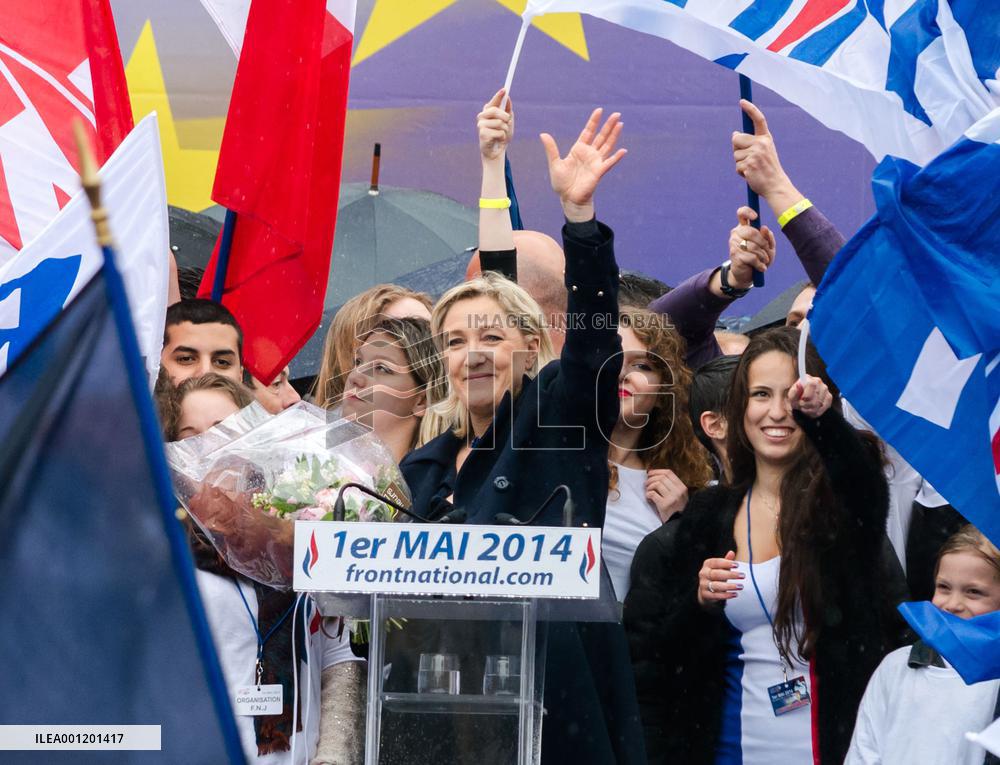 Far-right French party leader Le Pen joins demonstration