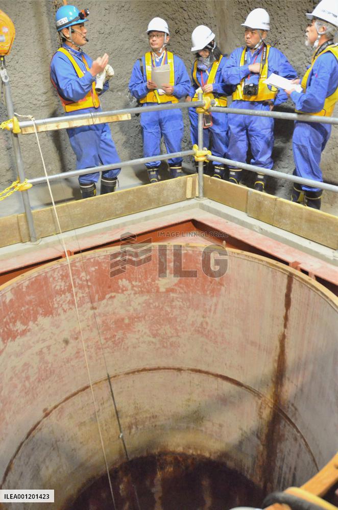 Test burial pit for radioactive waste opened to press