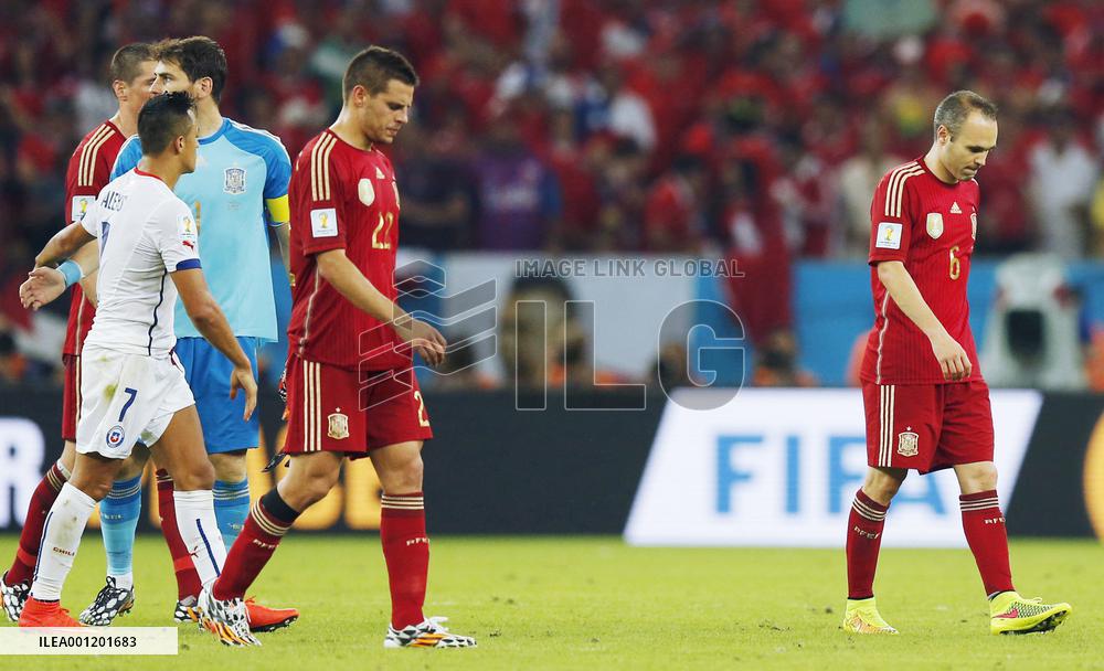 World Cup holders Spain crash out in 2-0 loss to Chile