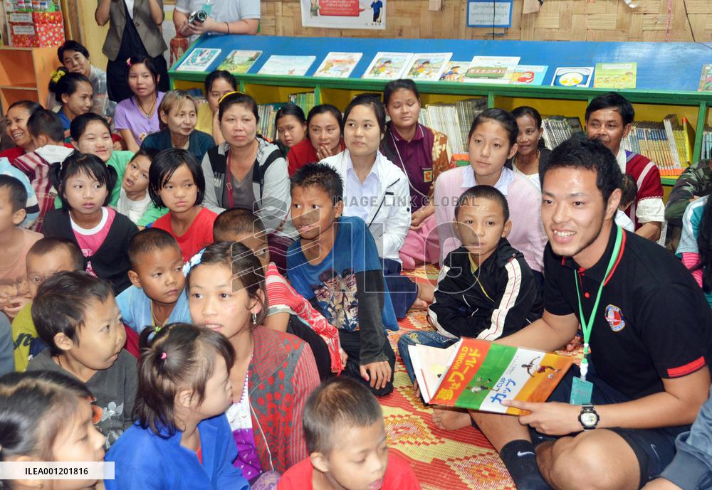 Ex-Japanese footballer reads book for kids at refugee camp