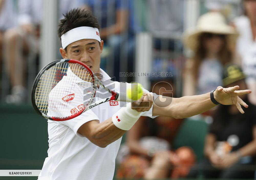 Japan's Nishikori in action at Wimbledon