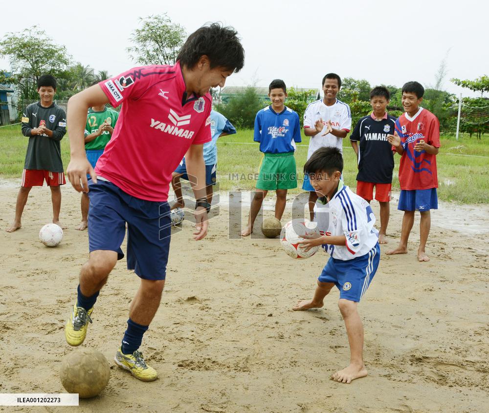 C. Osaka coach teaches children at foster home in Yangon