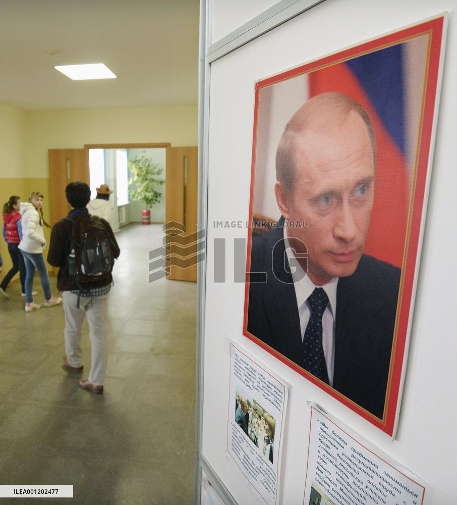 Putin photo at Russian school on Japan-claimed Shikotan isle