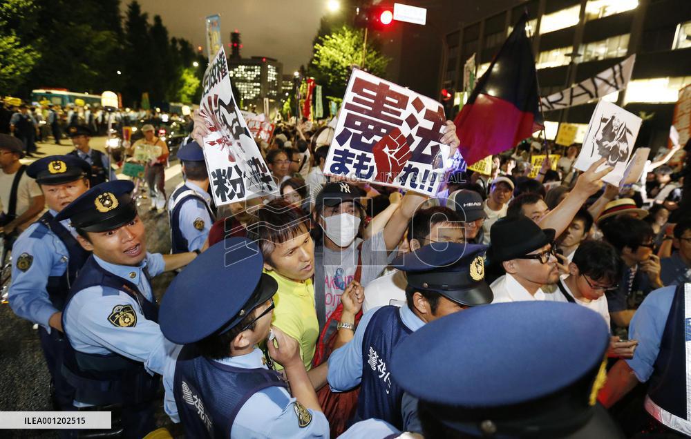 10,000 protest in Tokyo over security policy change