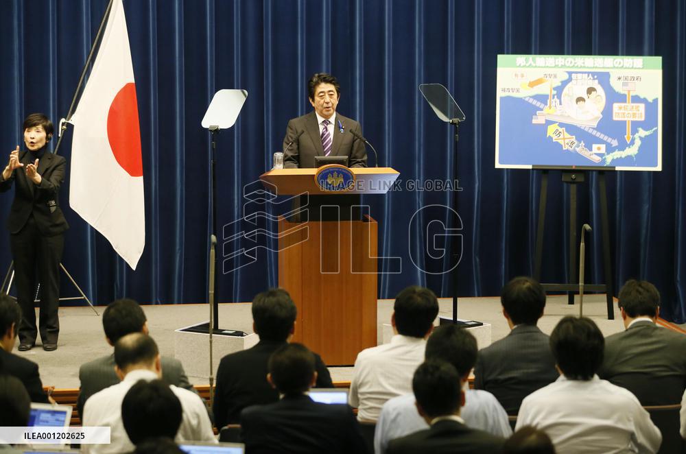Cabinet OKs collective self-defense, reinterprets Constitution