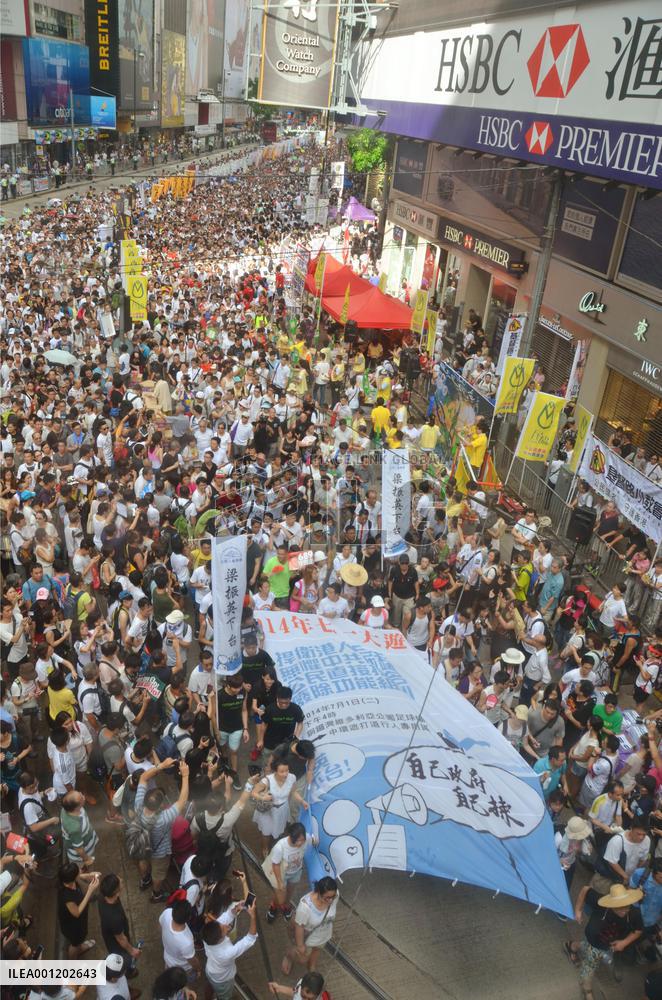 Tens of thousands march in H.K. pro-democracy protest on anniversary