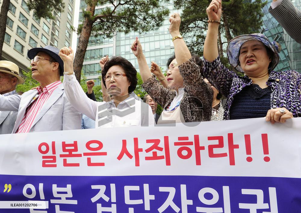 Protests in Seoul over Japan's security policy change