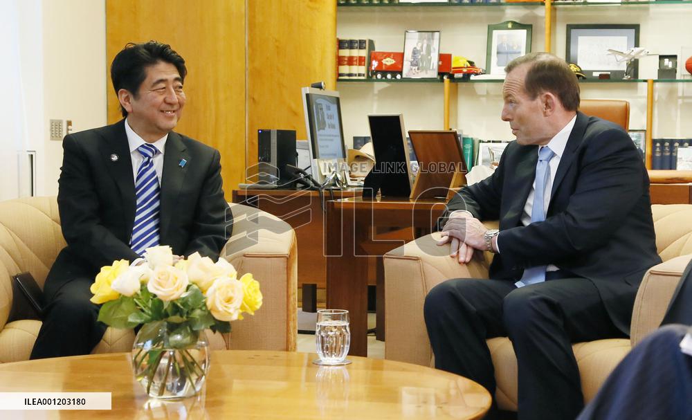 Japan, Australia sign accords on defense equipment, free trade