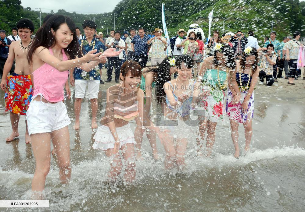 Fukushima beach kicks off sea-bathing season