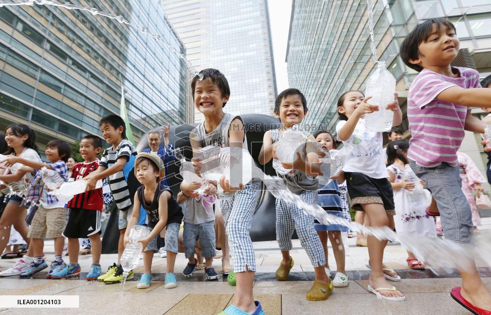 Cooling streets with water on hot summer day