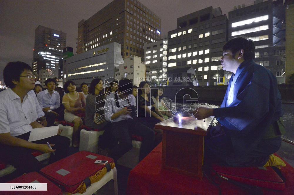 Storyteller tells ghost tale aboard ship on river