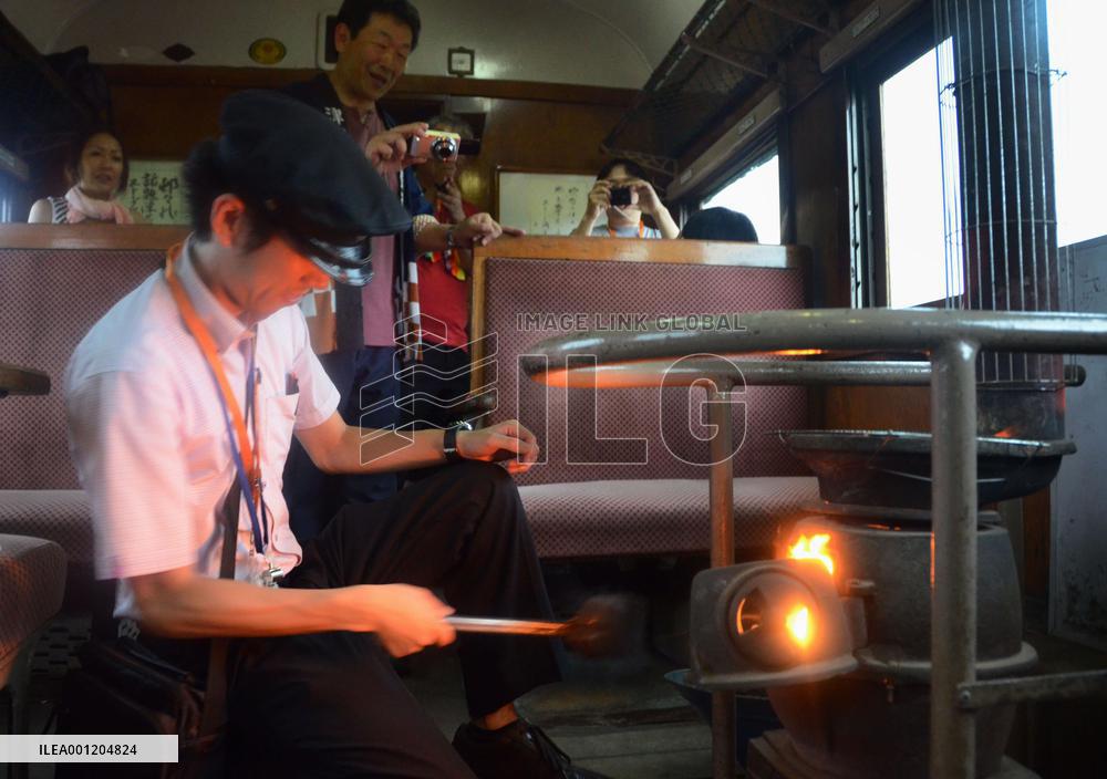 Conductor adds coal on 'stove train' in northern Japan