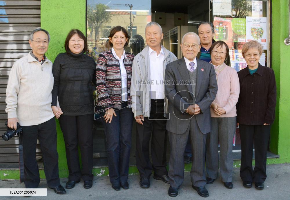 Members of A-bomb victim group in Brazil pose for photo