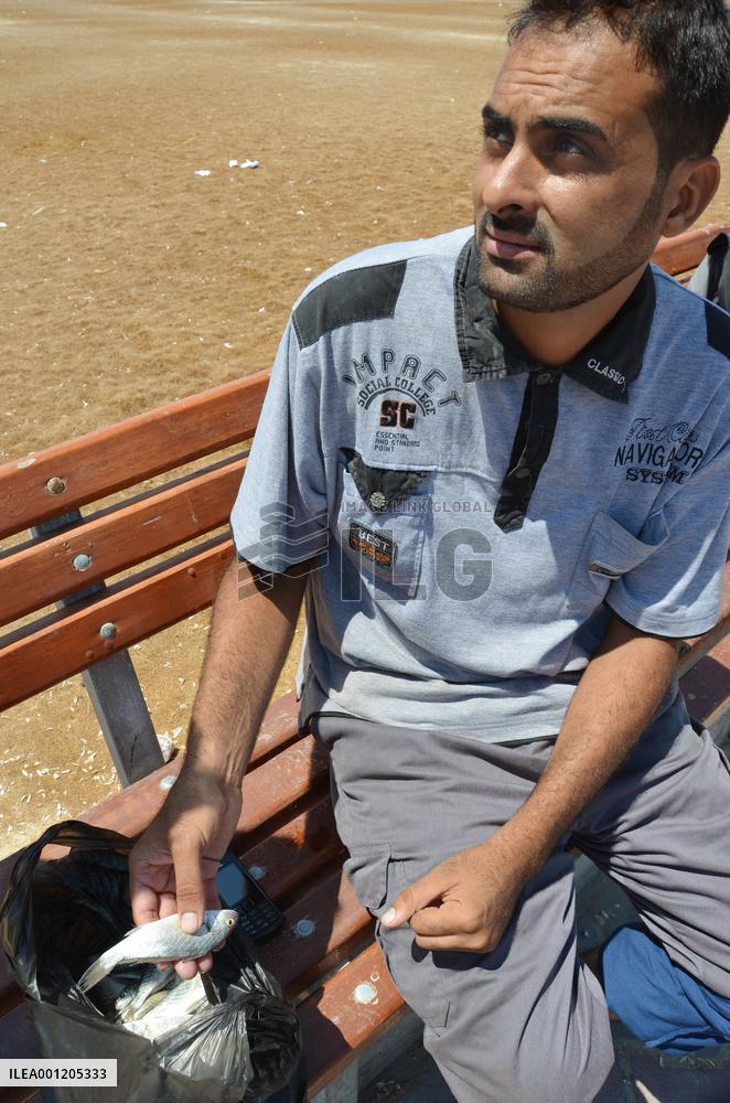 Palestinians struggle to fish in restricted waters