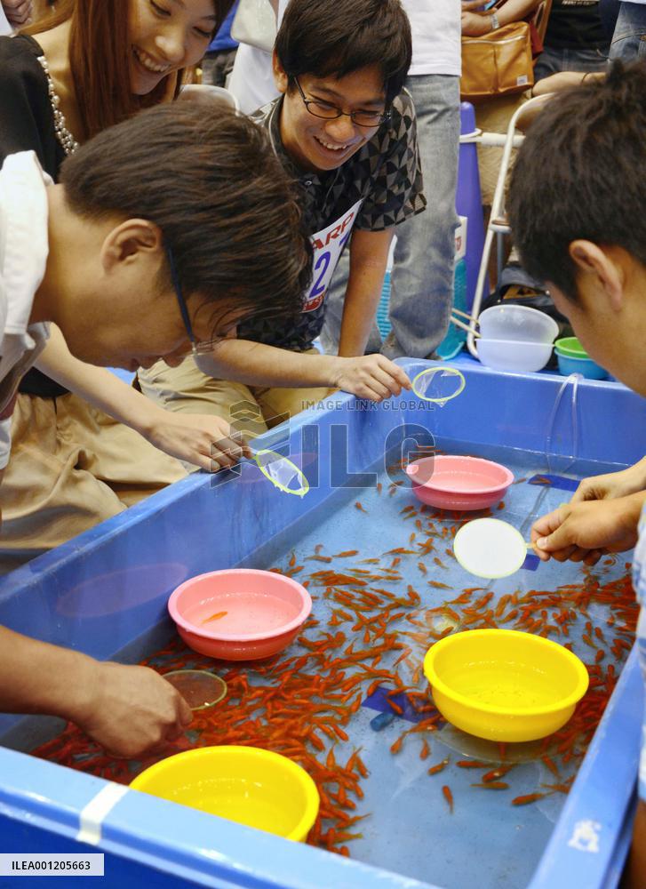 Goldfish scooping competition in Nara Pref.