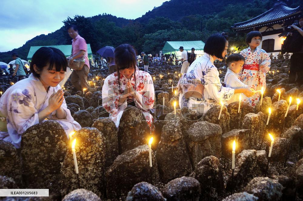 Candle-lighting ritual in Kyoto for deceased